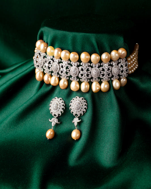 Displayed on a dark green fabric background, Deepa's Imperial Indulgence Necklace Set by Chandrani Pearls, which includes matching earrings, exudes an air of imperial indulgence.