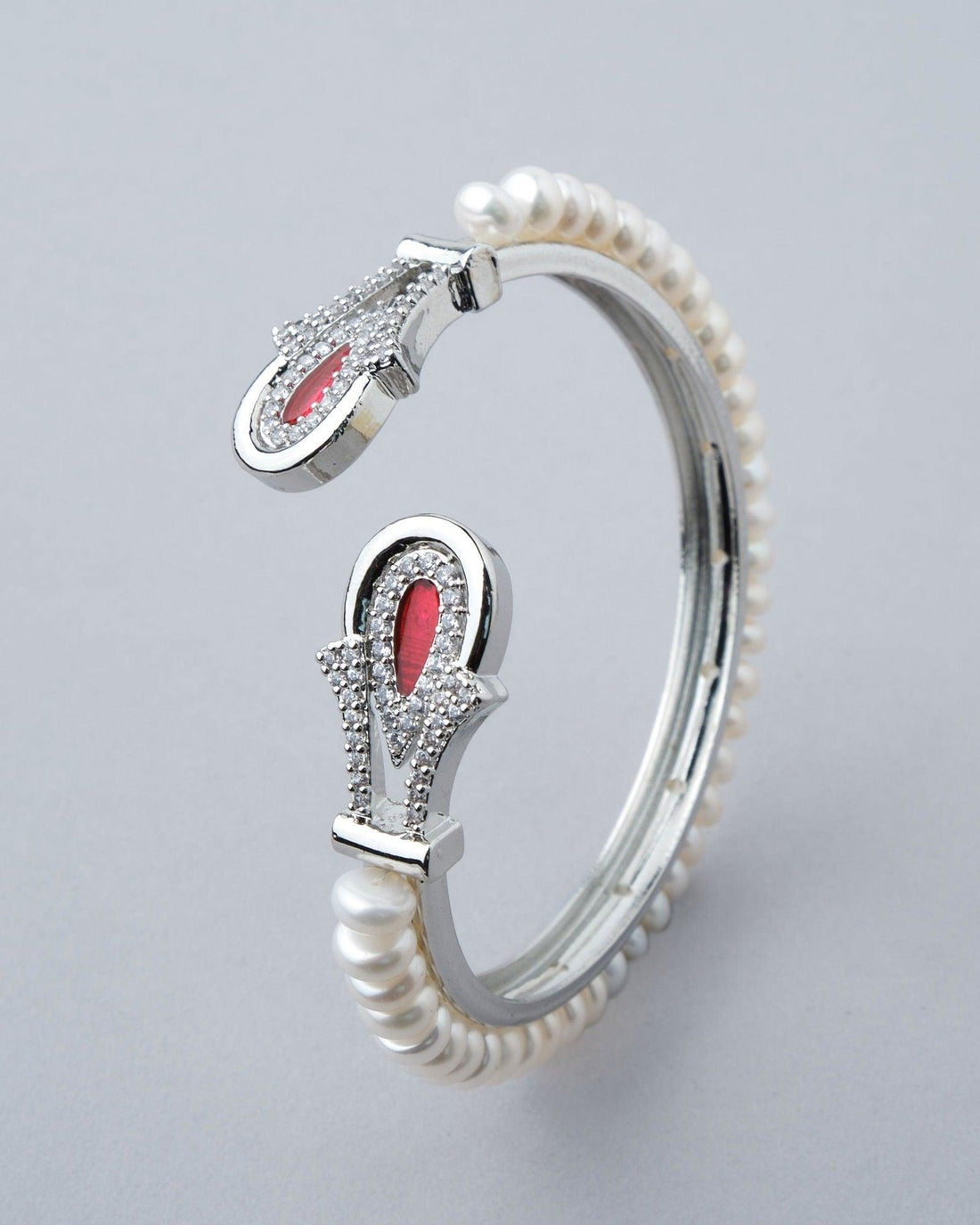 Fashionable Stone Studded Pearl Bangle - Chandrani Pearls