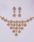 Gorgeous and Trendy AD Stone and Pearl Studded Set - Chandrani Pearls