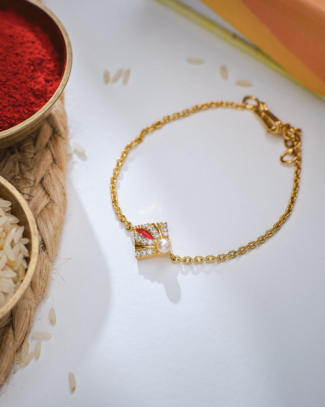 Sparkling Cute Pearl Stud Rakhi for Bhaiya