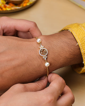Charming OM Pearl Cute Rakhi for Brother