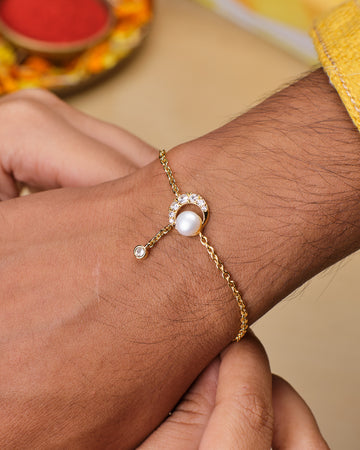 Cute & Simple Pearl Rakhi for Bhaiya