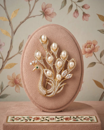 Gold-Plated Regal Peacock Brooch with Pearl Feather