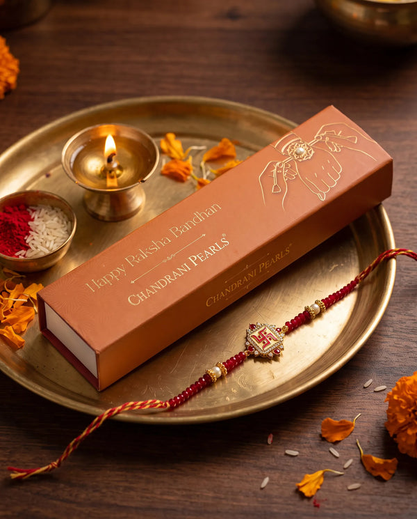 Traditional Auspicious Swastik Red Crystal & Pearl Thread Rakhi
