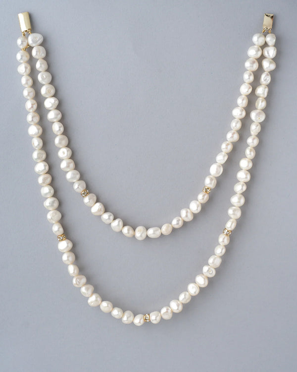 Un-even Shaped Pearl Lariat with CZ Charm