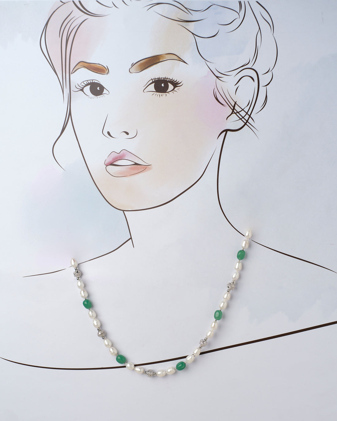 The Rasvatta - The Olive Elegance Pearls And Beads Necklace by Chandrani Pearls, showcasing alternating white pearls, green beads, and silver accents, elegantly rests on a purple surface with a pink edge.