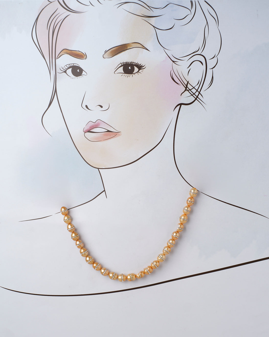 The Citizen Of The Globe Pearl Necklace by Chandrani Pearls features golden beads and rhinestone accents on a purple surface, captivating jewelry lovers. Delicately framed with small flowers, it's truly a stunning piece.