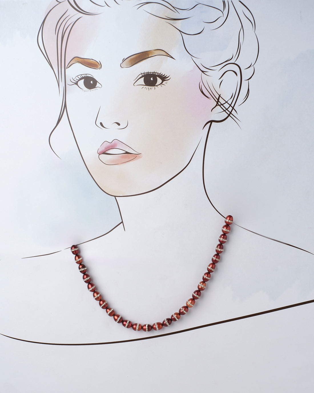 The Cherry On The Cake Pearl Necklace by Chandrani Pearls, featuring red pearls with silver spacers, elegantly rests on a blue and pink surface. Delicate white flowers enhance its allure, making it an ideal statement piece for any formal gown.