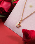 Shiv ling Omkara 925 Silver Pendant by Chandrani Pearls India, blending classic charm—perfect for daily wear. Displayed on a white surface with red roses nearby.