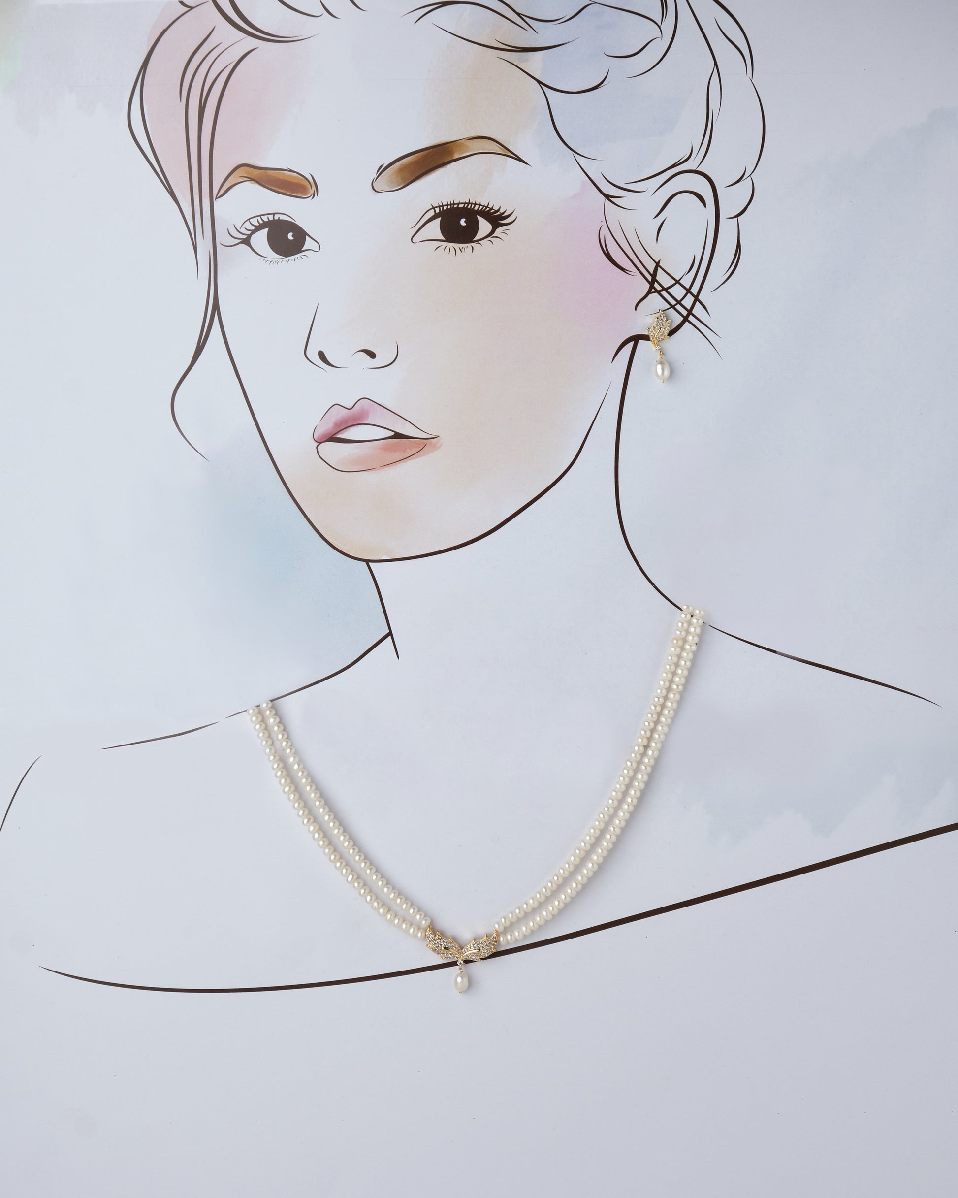 A drawing of a woman wearing Chandrani Pearls' Mesmerising Leafy Pearl Necklace and earrings.