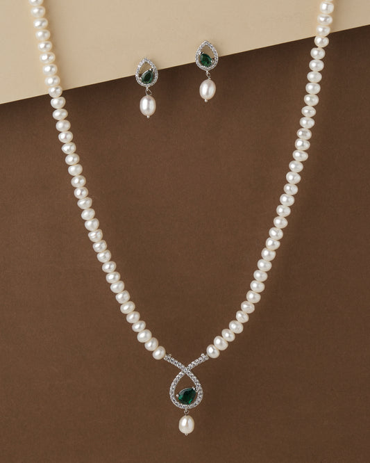 A Lyrical Tear Drop Pearl necklace and earrings set by Chandrani Pearls.