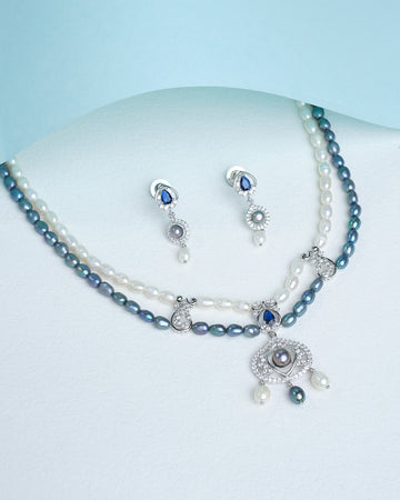 A stunning blend of lustrous pearls and sparkling CZ stones—pure elegance