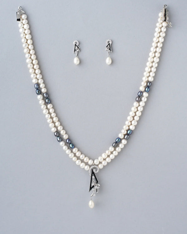 Beautifully handcrafted pearl necklace with delicate matching hangs