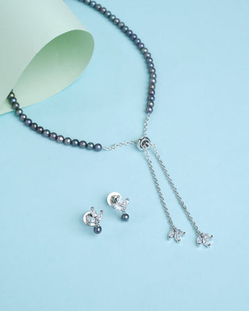 A stunning blend of lustrous pearls and sparkling CZ stones—pure elegance