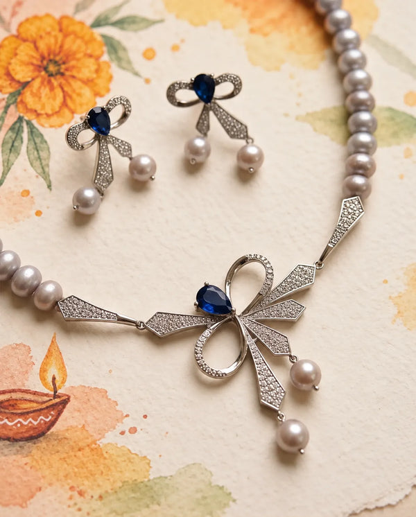 Silver-Tone Grey Pearl Necklace Set with Blue Sapphire CZ Bow Motif