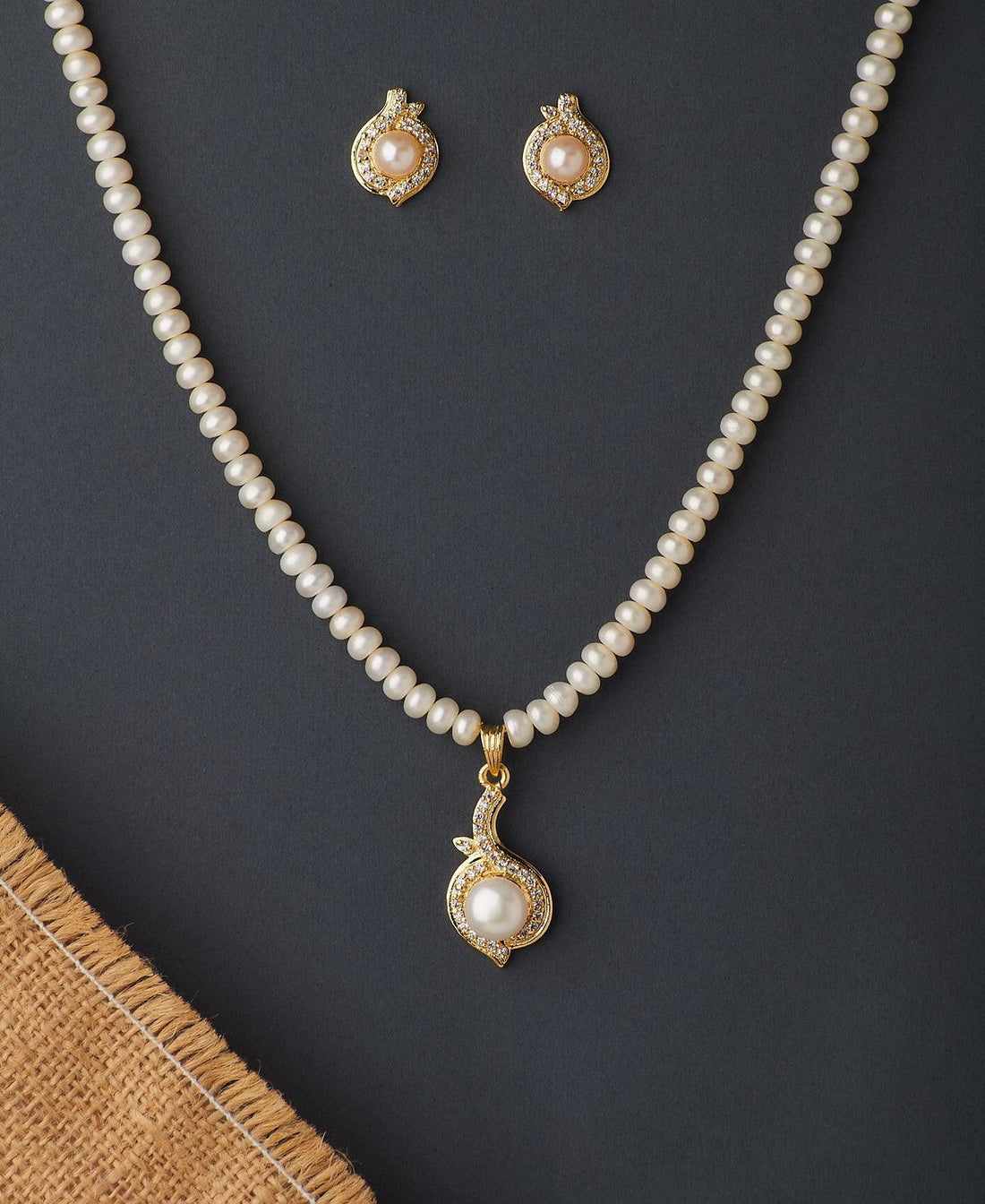 Simple and Elegant Stone Studded Pendant Set - Chandrani Pearls
