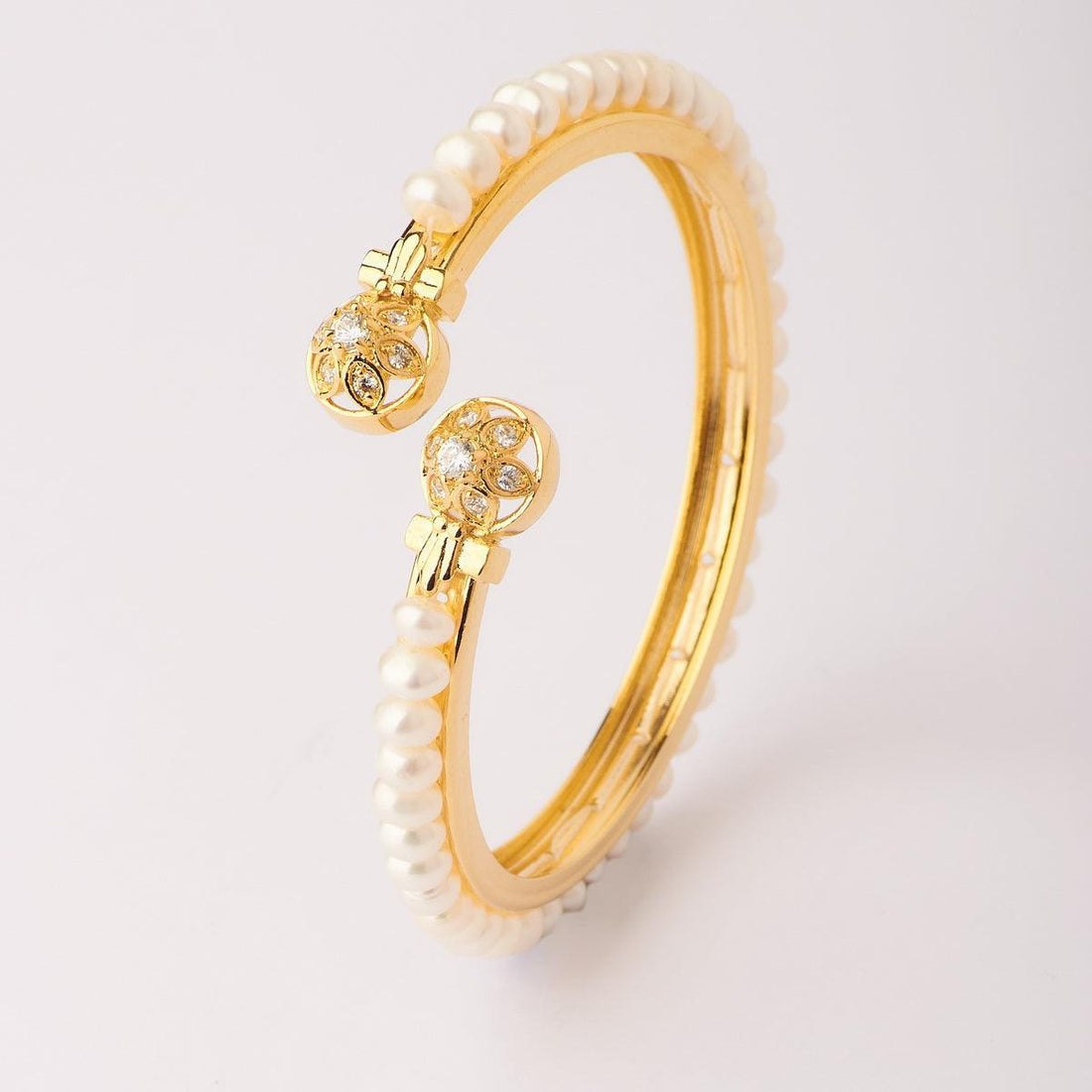 Stunning Stone Studded Pearl Bangle - Chandrani Pearls