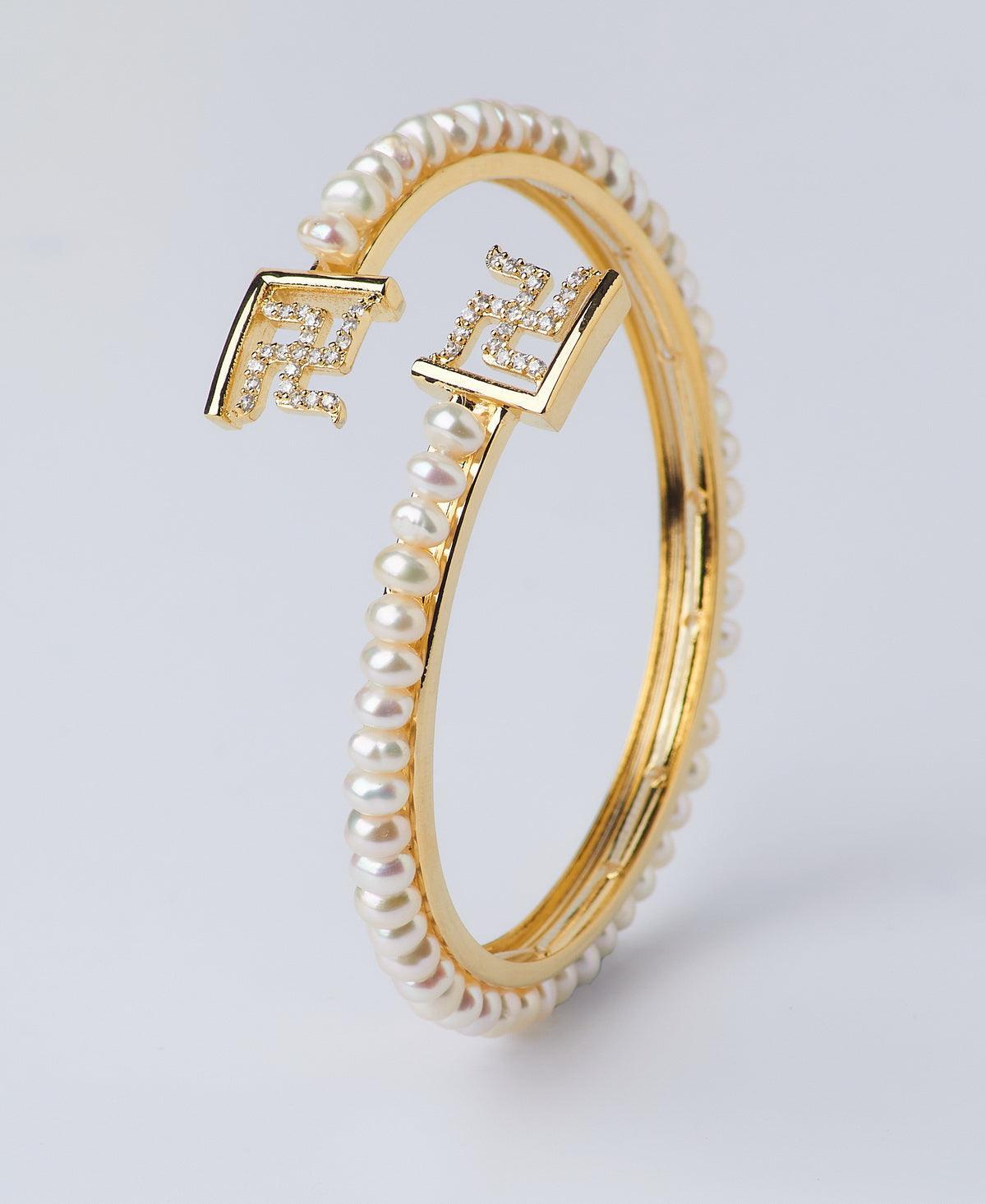 Swastik Stone Studded Pearl Bangle - Chandrani Pearls