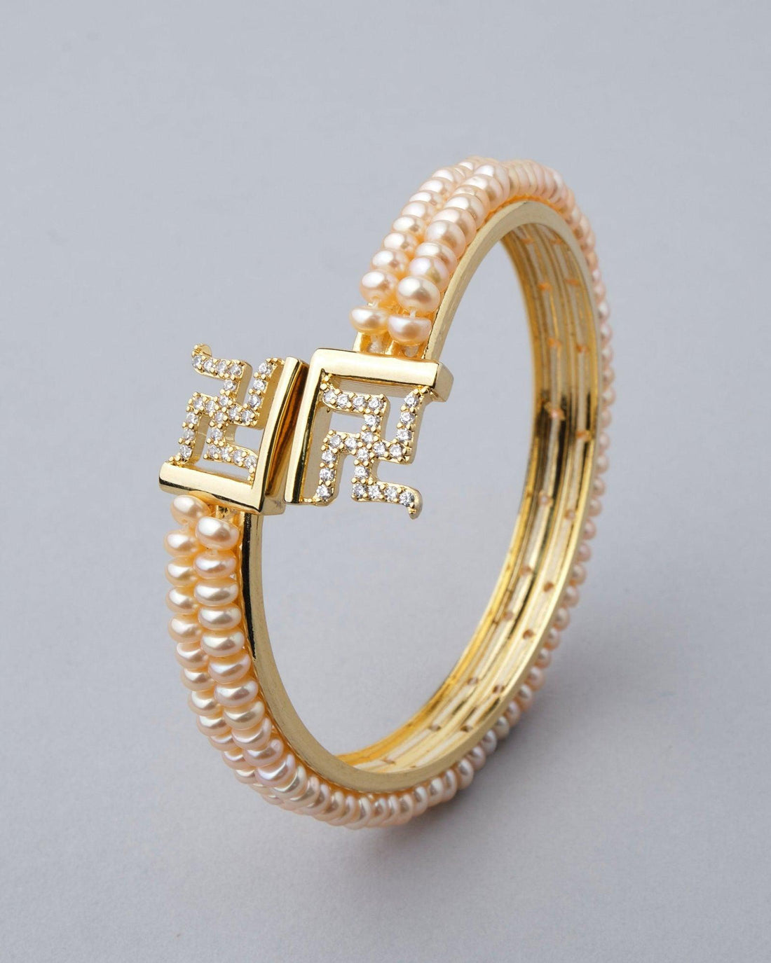 Swastik Stone Studded Pearl Bangle - Chandrani Pearls