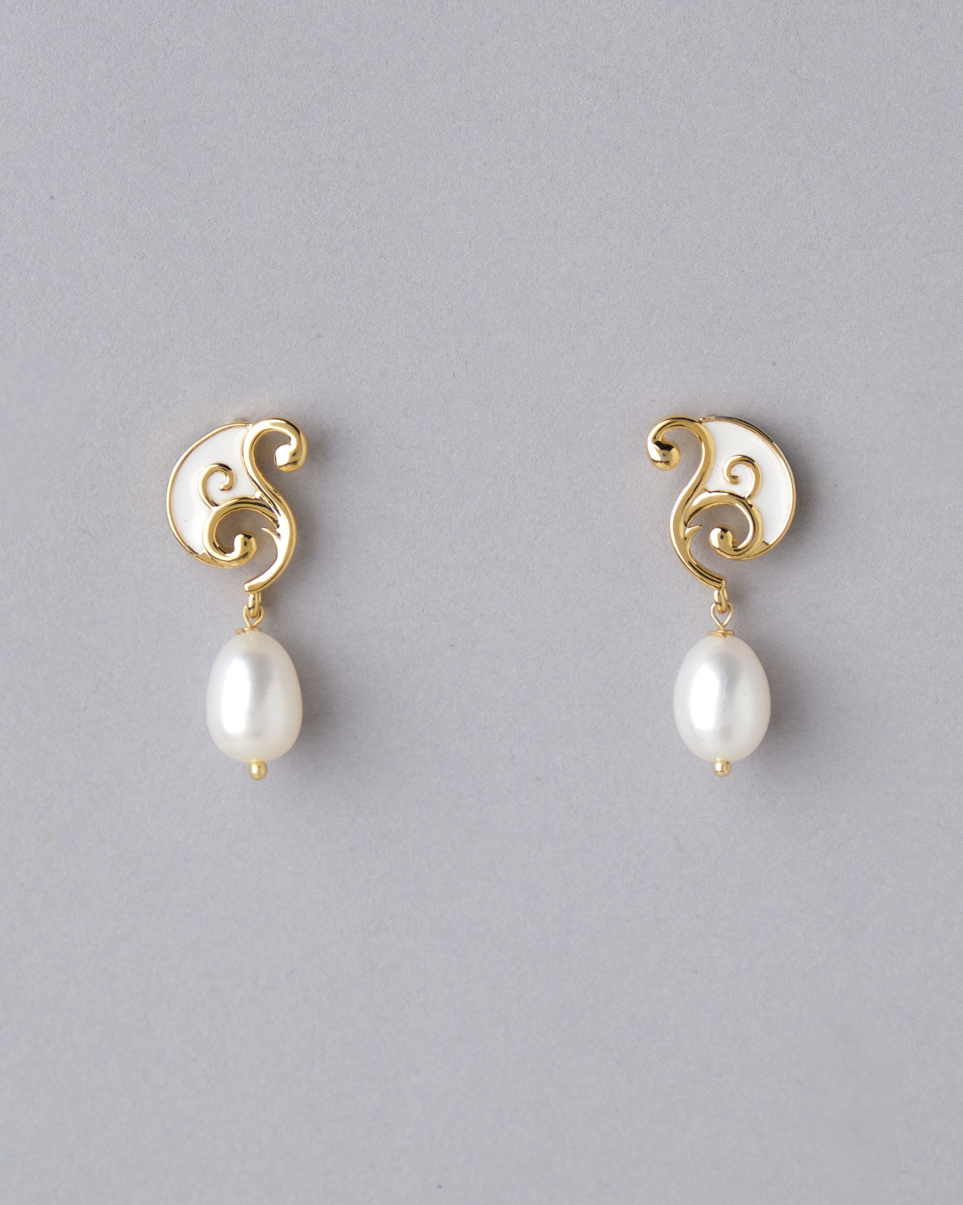A pair of Chandrani Pearls Sophisticated Dainty Pearl Drop Earrings.