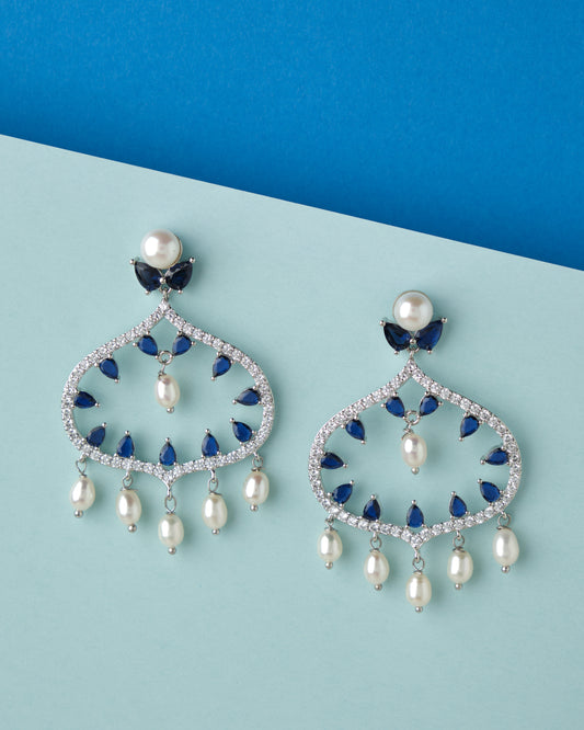 A pair of Ghazala Chand Bali Earrings with pearls and diamonds from Chandrani Pearls.
