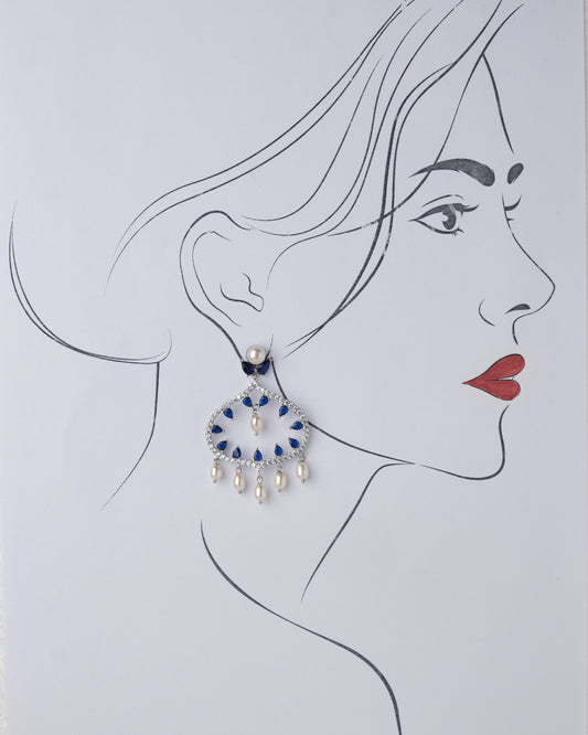 A drawing of a woman's face with Ghazala Chand Bali Earrings and pearls by Chandrani Pearls.