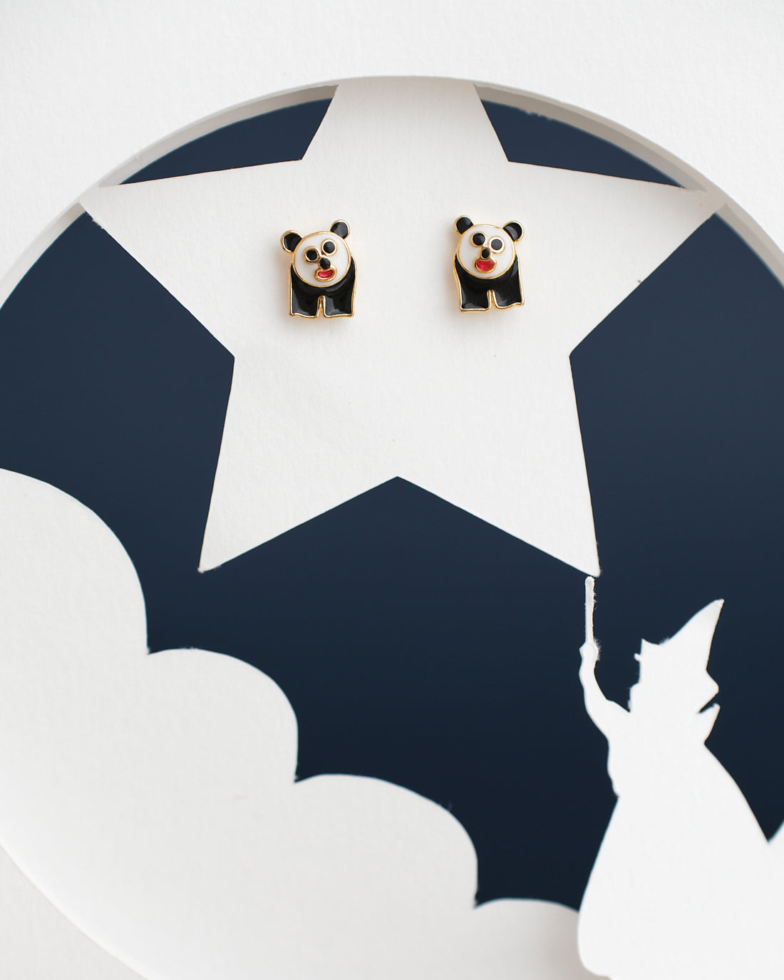 The Cute Panda Stud Earring by Chandrani Pearls India is showcased on a star cut-out featuring a wizard with a wand.