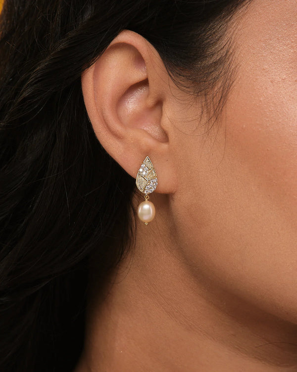 Crafted with high-shine CZ stones and smooth pearls