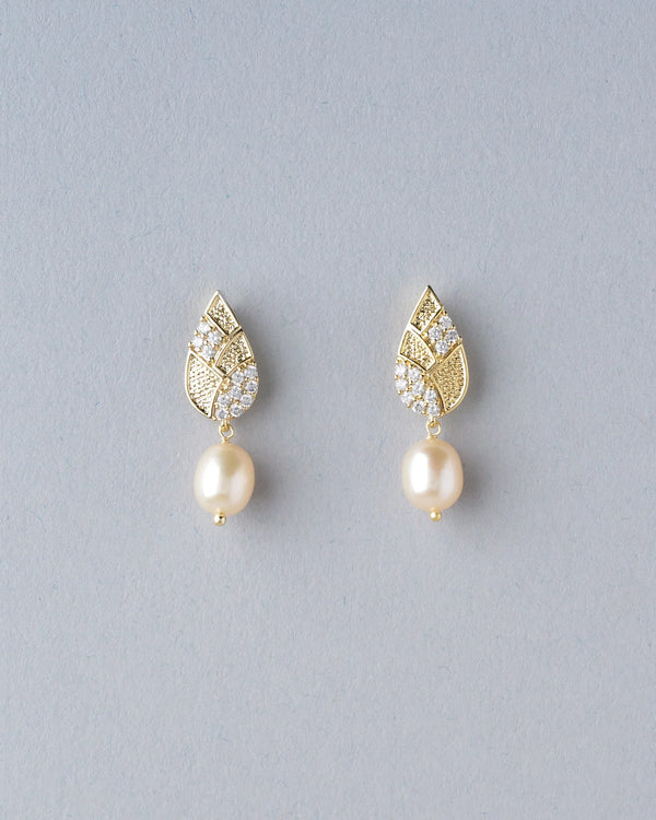 Crafted with high-shine CZ stones and smooth pearls