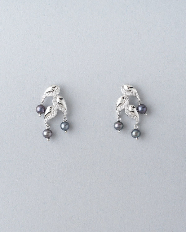 Beautiful and trendy, this pearl and CZ set adds sparkle and style to any look