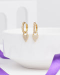 Chandrani Pearls' Teardrop CZ Earrings in Elegant Demifine Silver shown on a white dish, with a purple ribbon in the foreground.