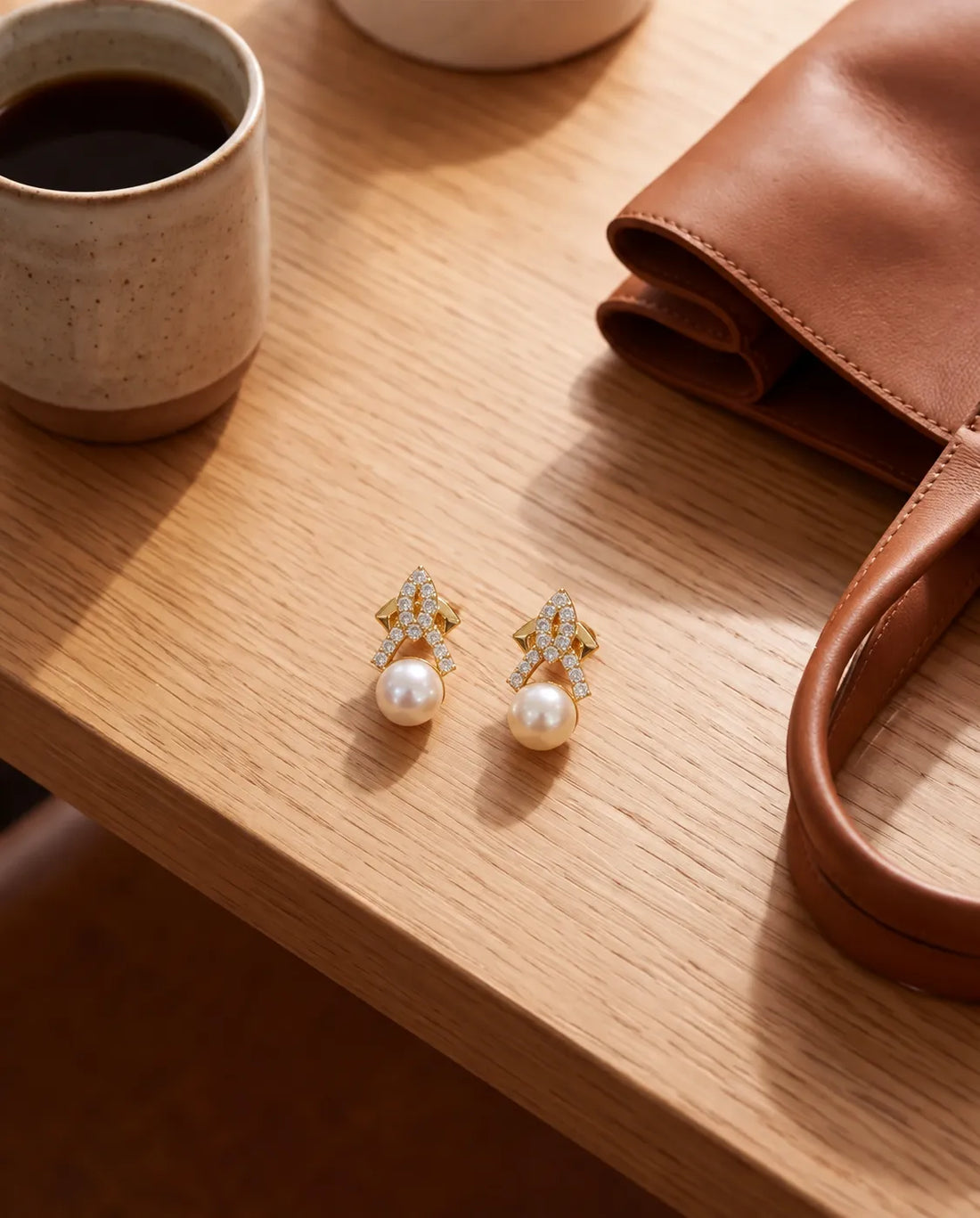 Gold-Tone Cross-Ribbon Cubic Zirconia Stud Earrings with Pearl Accents