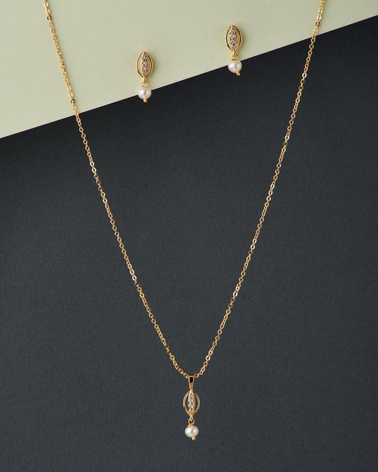 A cute pendant matched with golden polish chain with matching earrings. - Chandrani Pearls