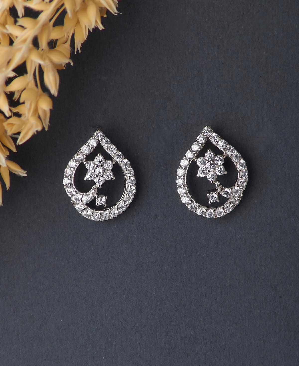 Dainty Stone Studded Silver Flower Earrings - Chandrani Pearls