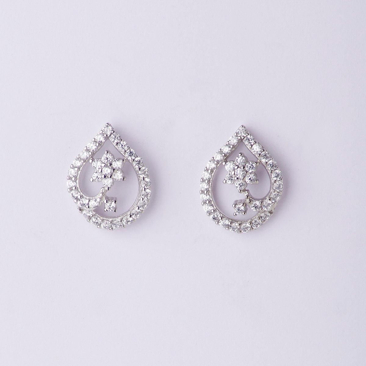 Dainty Stone Studded Silver Flower Earrings - Chandrani Pearls