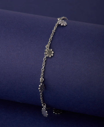 Flower Charms Oxidised Silver Bracelet - Chandrani Pearls