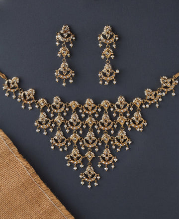 Gorgeous and Trendy AD Stone and Pearl Studded Set - Chandrani Pearls