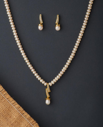 Simple and Elegant Stone Studded Pendant Set - Chandrani Pearls