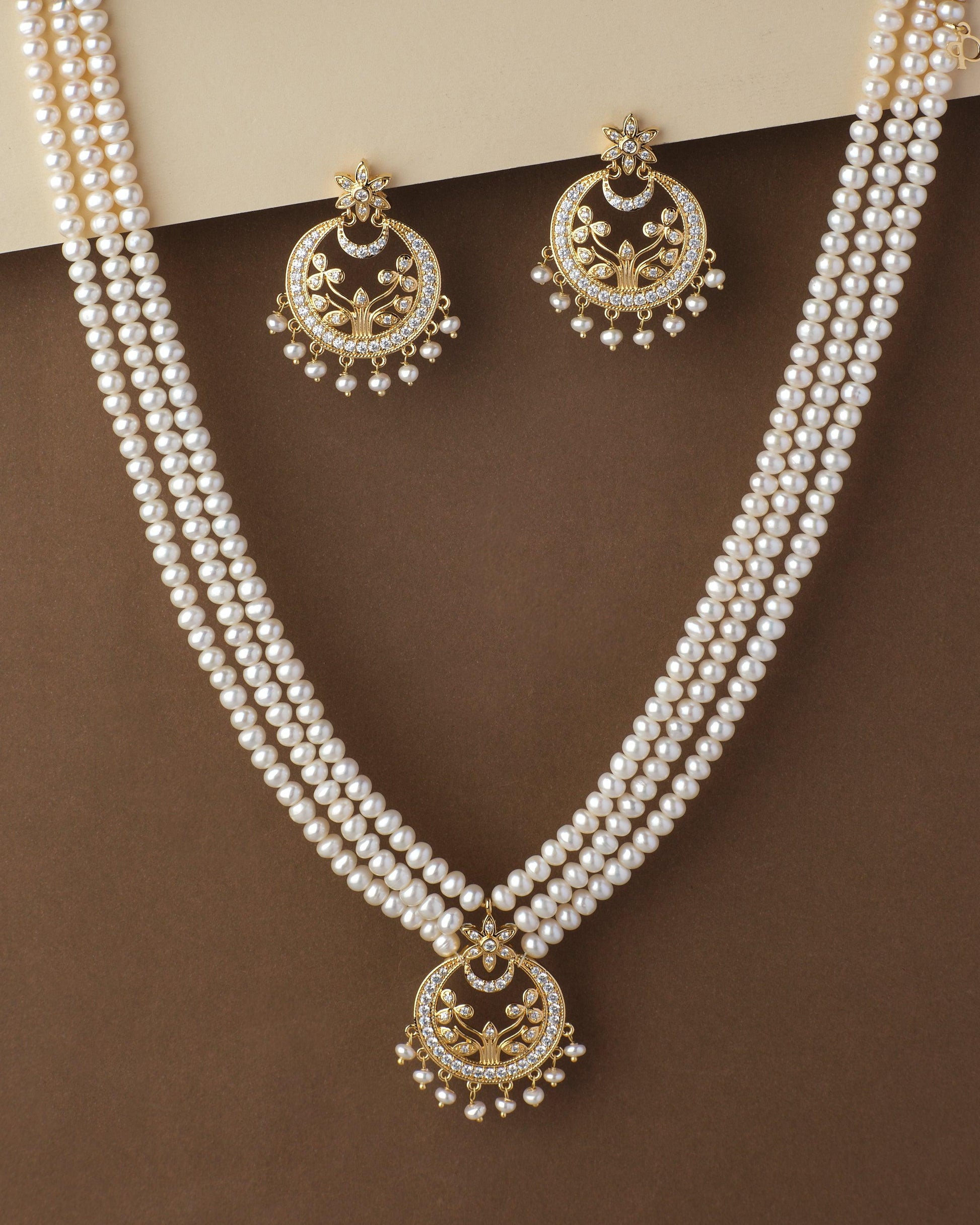 https://chandranipearls.in/cdn/shop/files/traditional-ad-pearl-necklace-set-chandrani-pearls-1-23503429926979.jpg?v=1695120891&width=1946