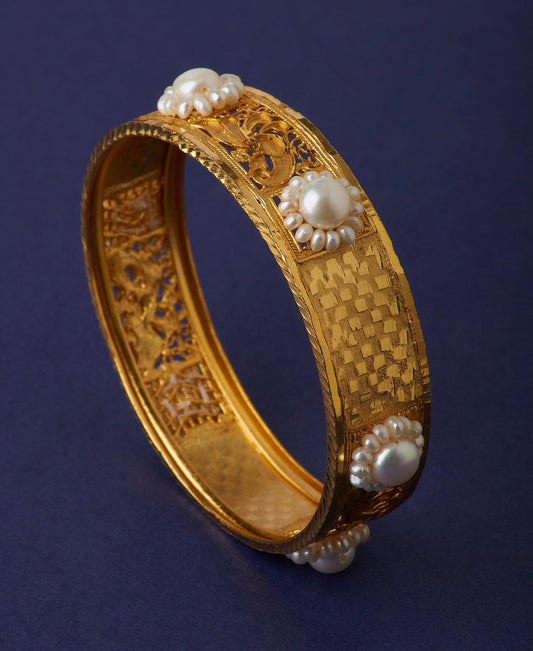 Trendy Pearl Studded Metallic Pearl Bangle - Chandrani Pearls